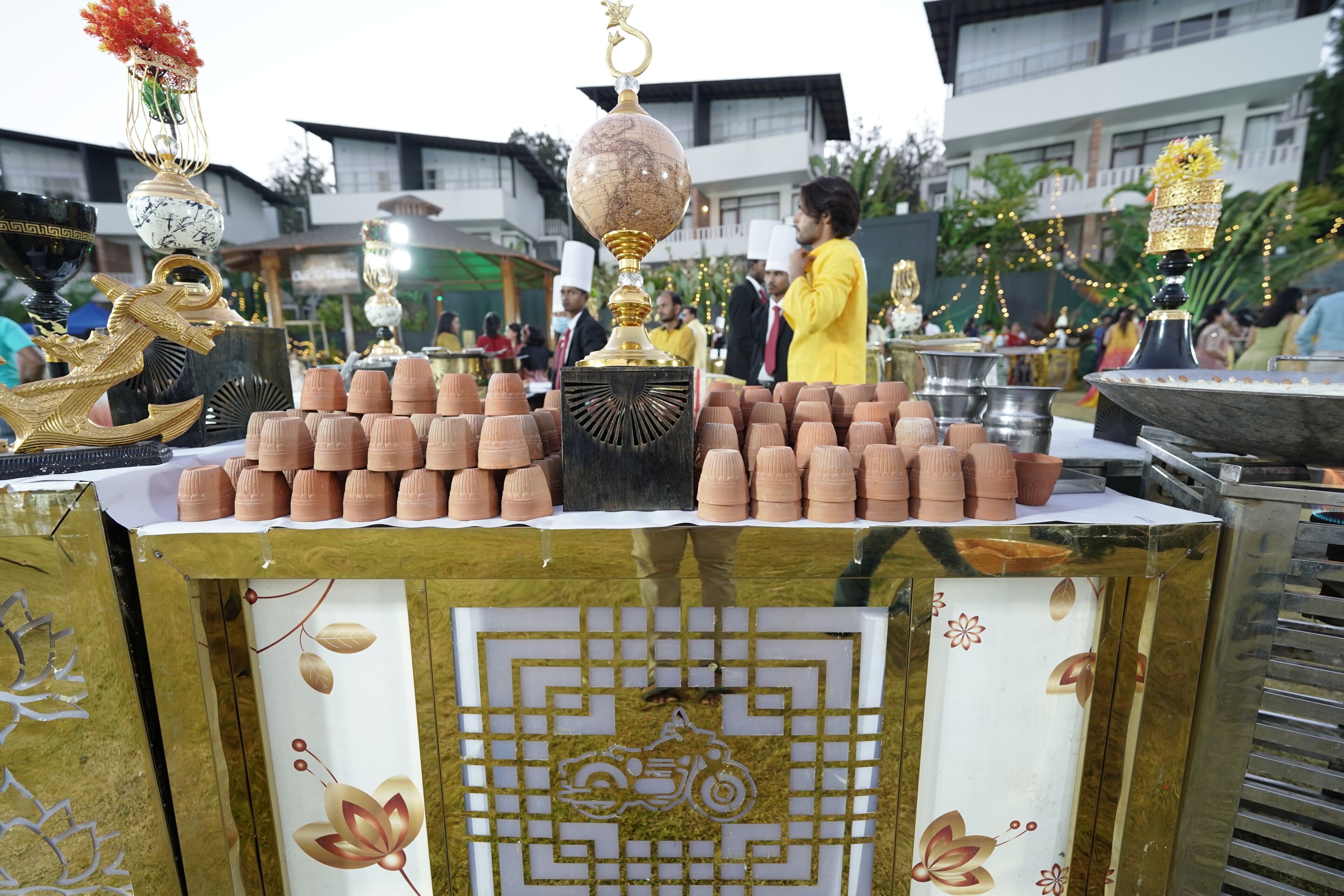 A display of traditional pottery and decorative items, possibly at a cultural event.