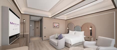 Habitación Deluxe, 1 cama King size (City side) | Área de sala de estar