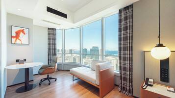 Premium bedding, down comforters, Tempur-Pedic beds, free minibar