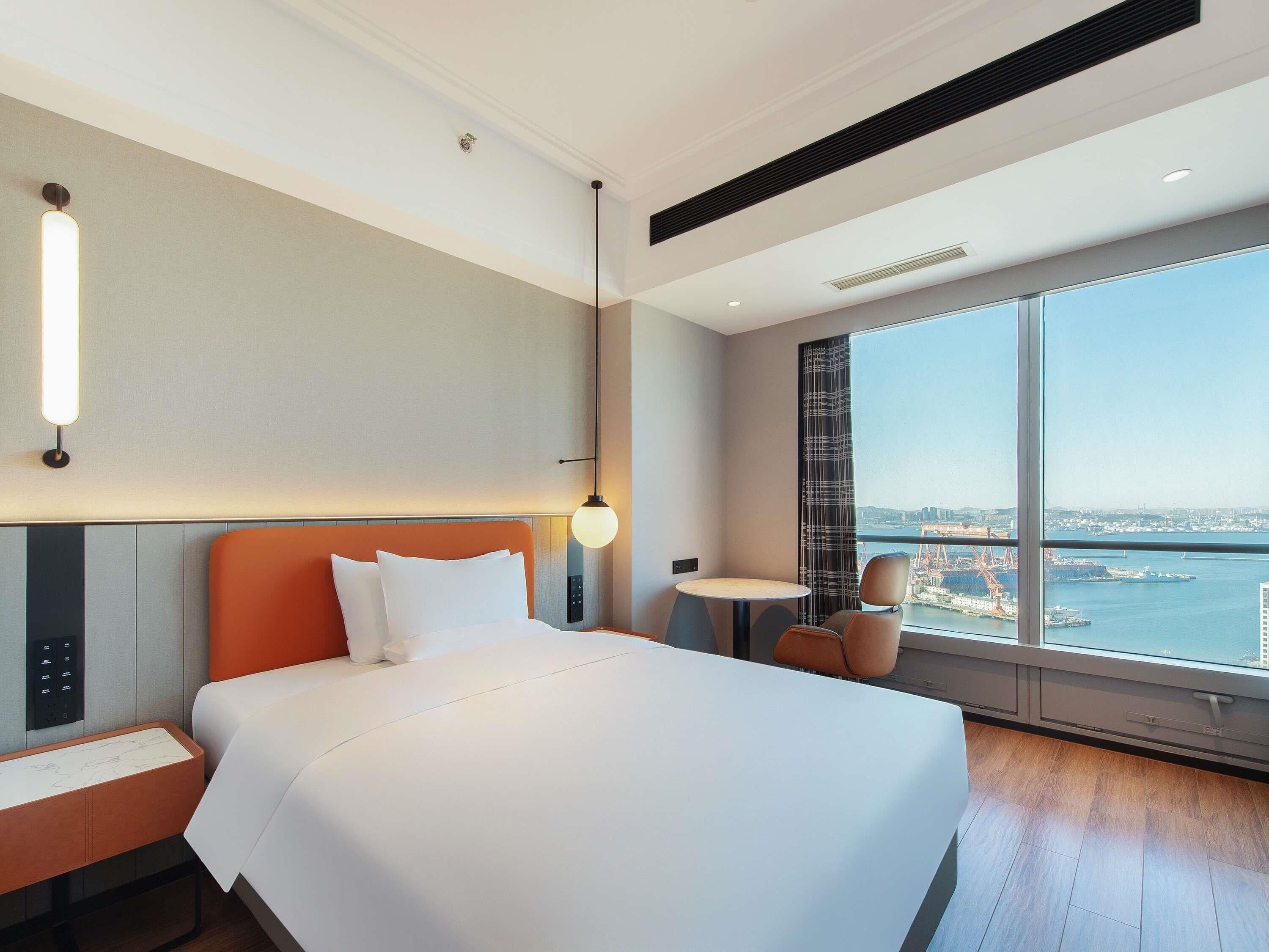 Suite Deluxe, varias camas | Ropa de cama de alta calidad y edredones de plumas