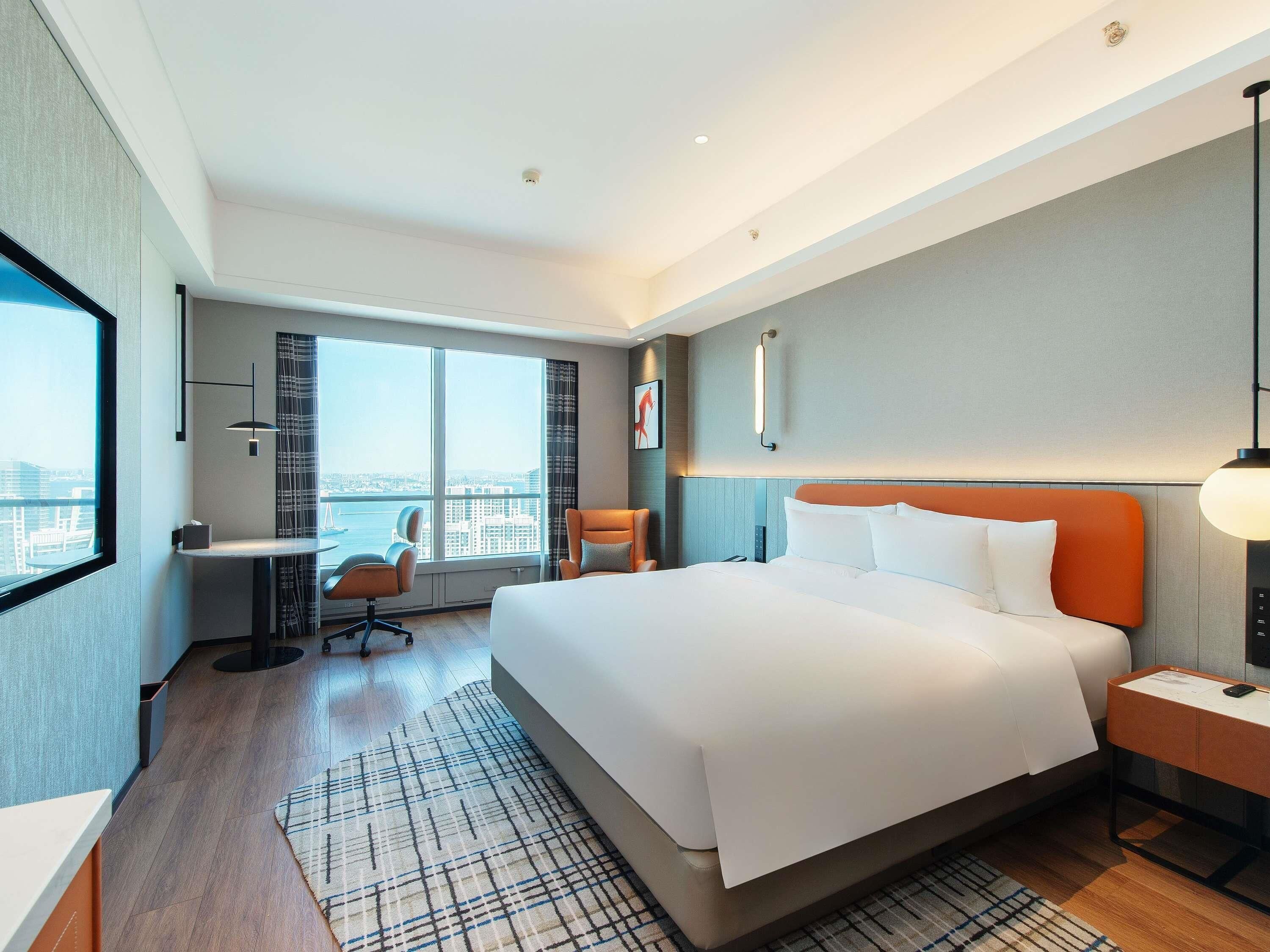Habitación Deluxe, 1 cama de matrimonio grande, vistas a la bahía | Ropa de cama de alta calidad y edredones de plumas