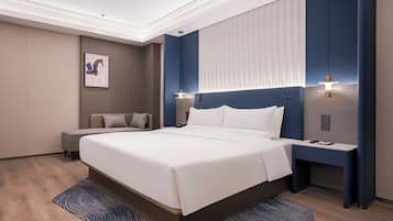 Executive Room, 1 King Bed | Down comforters, minibar, individually decorated, desk