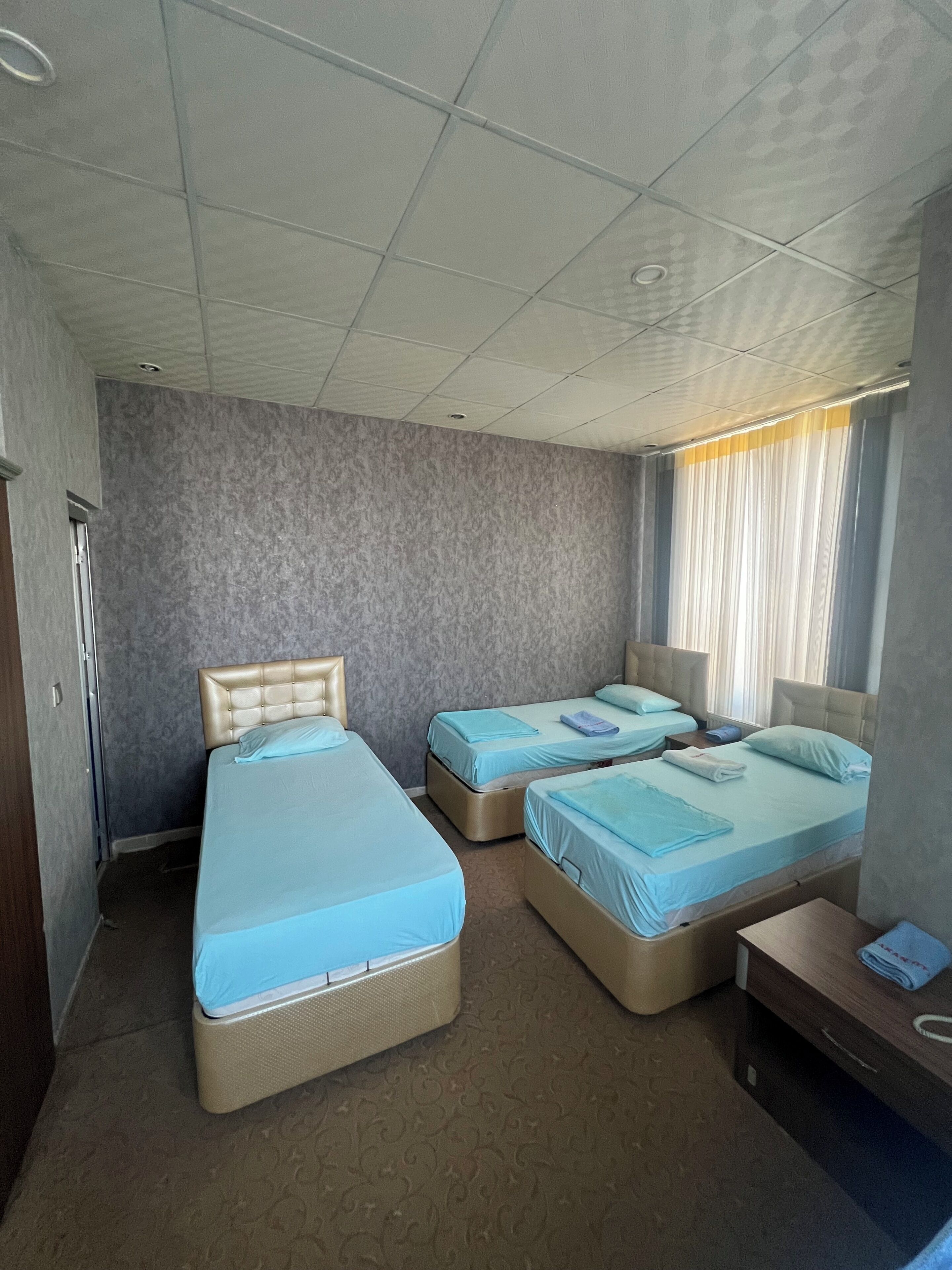 Kolmen hengen classic-huone | Kylpylä