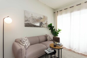 Living area - A studio in Salamanca, Madrid's most elegant quarter, where a sectioned-off sleeping area creates a flexible home with its own balcony and a shared pool for summer afternoons. (MADRID)