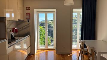 Superior Apartment, Balcony, River View | Private kitchen