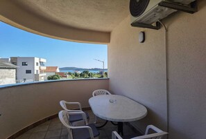 Outdoor dining - Quiet vacation home, residential area. 6 apartments with sea view. To beach 350m (Vodice)