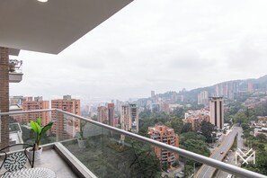 Apartamento, balcón, vistas a la ciudad | Jardines del alojamiento