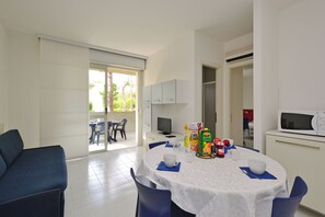 Apartment, 1 Bedroom, Balcony | Living room - Cozy Stay in Lignano (Lignano Sabbiadoro)