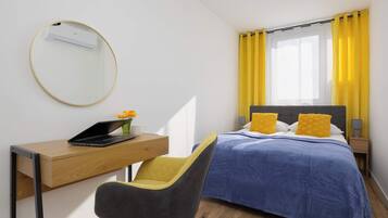 1 bedroom, desk, iron/ironing board, travel crib
