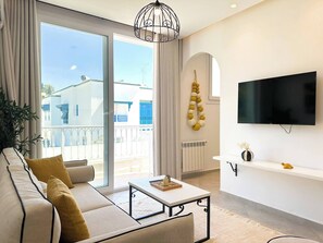 Apartamento, 1 quarto | Área de estar