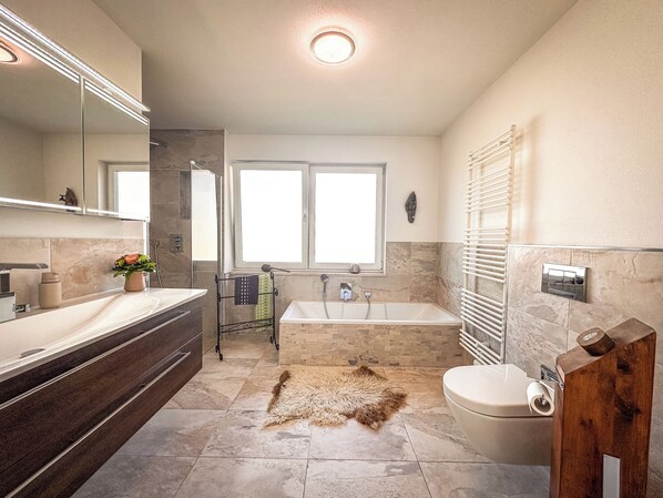 Shower, hair dryer, towels, soap