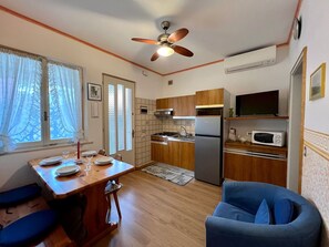 Apartment, 2 Bedrooms, Patio, Garden View | Interior - Relax in our Charming Patio in Lignano (Lignano Sabbiadoro)