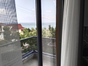 Familie suite, balkon, uitzicht op zee | Interieur