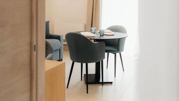 Superior Suite, City View | Living area