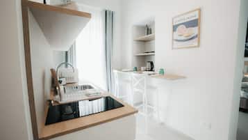 Double or Twin Room | Private kitchen | Espresso maker, coffee/tea maker, electric kettle, high chair