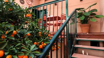 Alloggio Deluxe su due livelli, lato giardino | Terrazza/patio