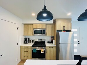 Fridge, microwave, oven, stovetop - Prime Location: 10 min drive to Downtown, 5 min drive to Commonwealth Stadium (Edmonton)