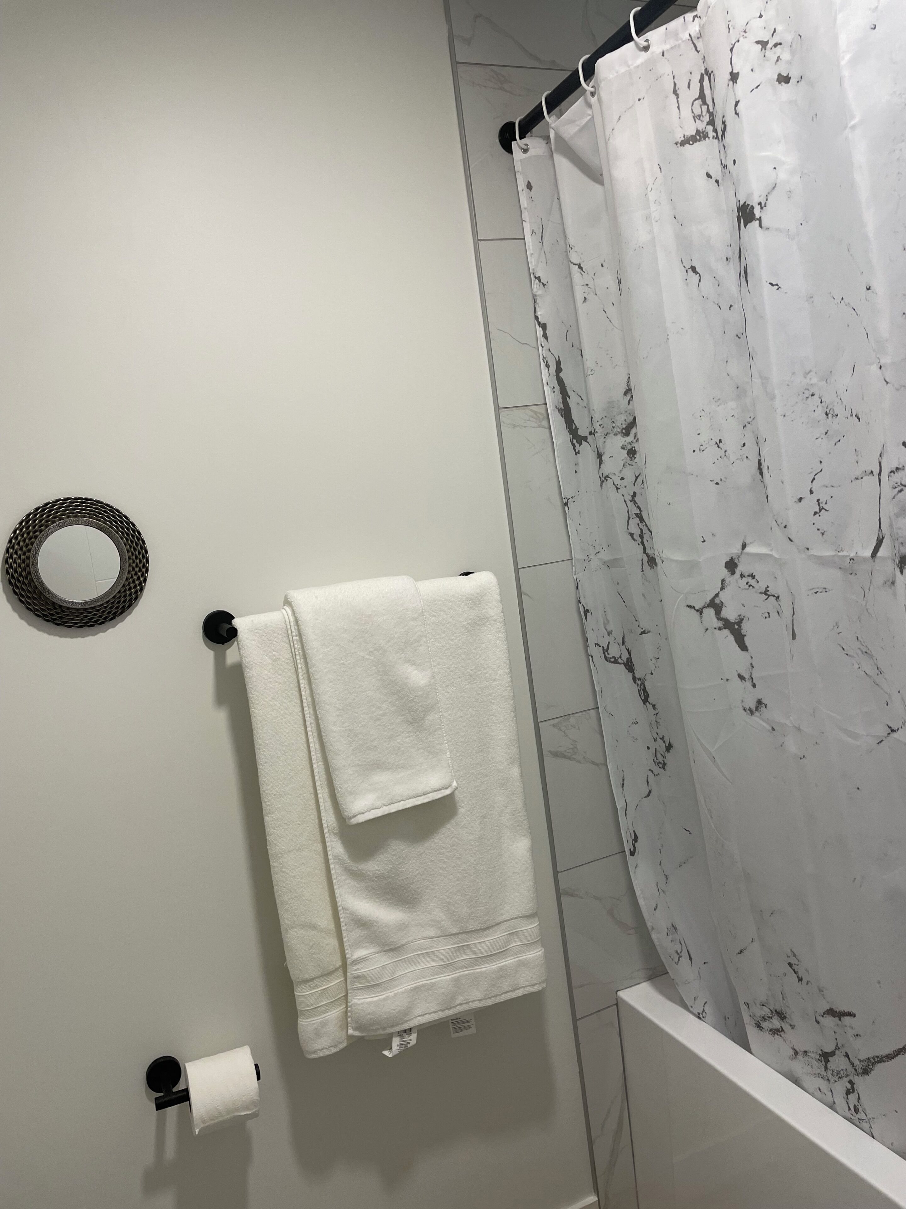 Shower, towels, soap, toilet paper
