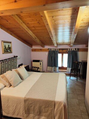 Family Quadruple Room, Balcony, Mountain View | Desk, free WiFi