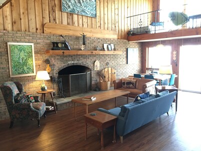 Clean, Rustic 4-bedroom cabin nestled in the woods in Sackets Harbor