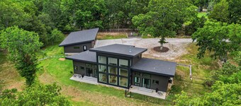 Modern Lakefront home with gentle walk to lake, flat yard.  Beautiful views.
