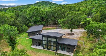 Modern Lakefront home with gentle walk to lake, flat yard. Beautiful views.