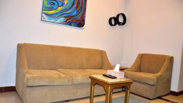 Suite, 2 habitaciones | Zona de estar