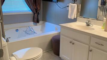 Shower, eco-friendly toiletries, hair dryer, towels