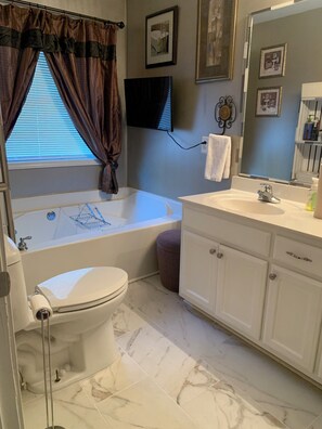 Shower, eco-friendly toiletries, hair dryer, towels