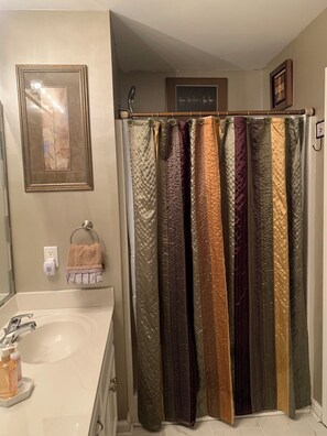 Shower, eco-friendly toiletries, hair dryer, towels