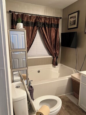 Shower, eco-friendly toiletries, hair dryer, towels