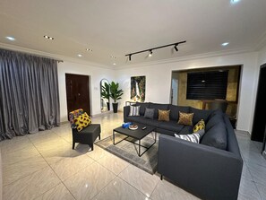 Living area - Scottsville by CheckersBNB (Abuja)