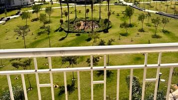 Superior Apartment, Balcony, Garden View | Property grounds