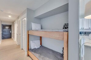 Iron/ironing board, free WiFi, bed sheets - Experience coastal charm at 0104 Seagrass Retreat, a 1-bedroom oceanfront condo in Carolina Beach. (Carolina Beach)