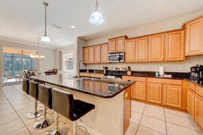 Fridge, microwave, oven, stovetop - Spacious 6BR Family Villa, 13 miles to Disney, Private Pool, Resort Waterpark (Kissimmee)