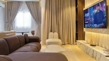 Appartement Standard, balcon, vue ville | Coin séjour