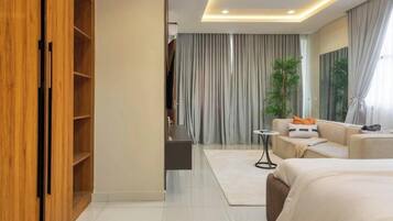 Standard Apartment, Balcony, City View | In-room safe, desk, laptop workspace, blackout drapes