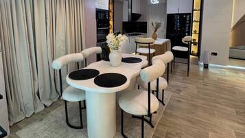 Standard Apartment, Balcony, City View | Dining
