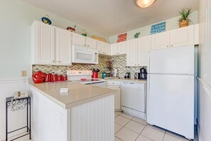 Private kitchen - Beachfront 1BR condo in Carolina Beach, perfect for 6, ocean views await! (Carolina Beach)