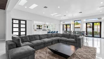 Villa | Living area | 55-inch Smart TV with digital channels