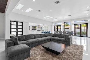 Villa | Living area | 55-inch Smart TV with digital channels - Luxury Miami Stay by Glam Homes (North Miami Beach)