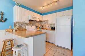 Private kitchen - Oceanfront 1-BR condo in Carolina Beach, sleeps 6 with stunning views. (Carolina Beach)