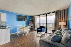 TV, books - Discover oceanfront bliss at 0310 Saltwater Serenity, Carolina Beach. (Carolina Beach)