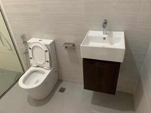 Classic Room | Bathroom - Teestone Hotels and Apartments (Ikeja)