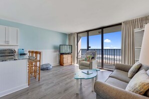 Living area - Oceanfront 1BR retreat with stunning views in Carolina Beach 0508 (Carolina Beach)