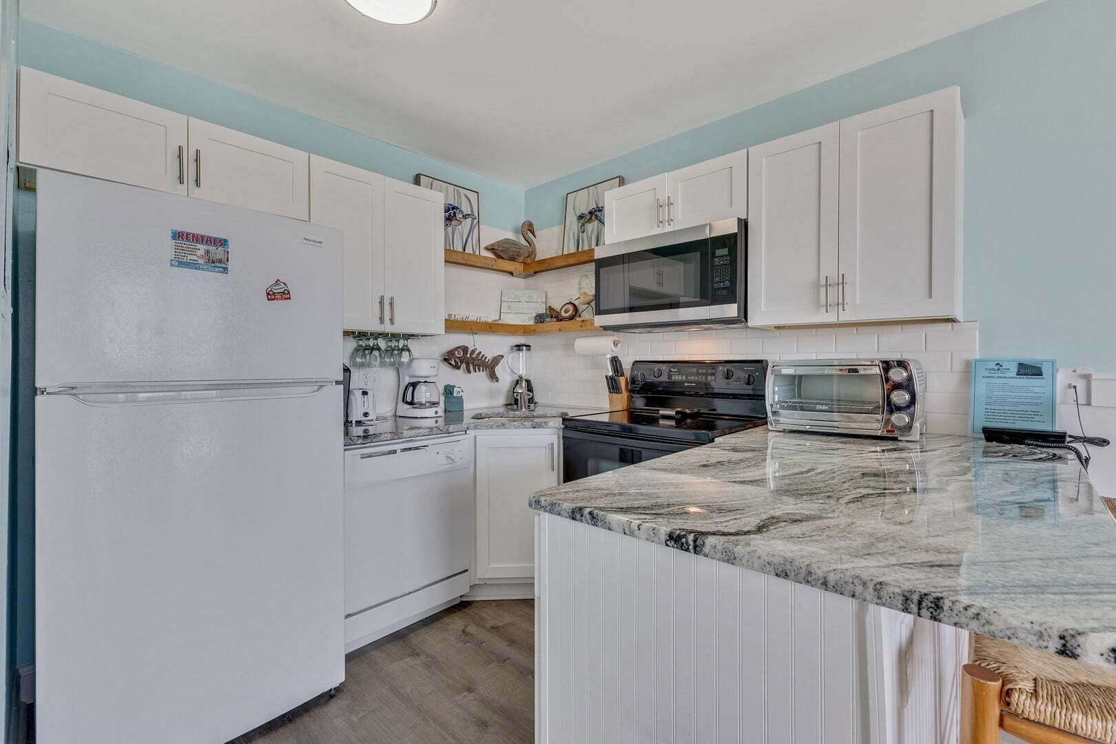 Coffee/tea maker, fridge, microwave, oven
