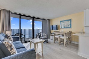 Living area - Oceanfront charm awaits at 0709 Seaside Serenade in Carolina Beach! (Carolina Beach)