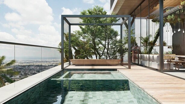A rooftop pool with a glass enclosure, wooden deck, and seating area with a view of the city. - Vol 29 - Miramar Hospedagens (João Pessoa)