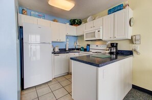 Private kitchen - Oceanfront 1-bedroom condo in Carolina Beach, perfect for 6 guests! (Carolina Beach)