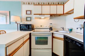 Private kitchen - Oceanfront 1-Bedroom Condo at Carolina Beach, sleeps 6 with stunning views. (Carolina Beach)